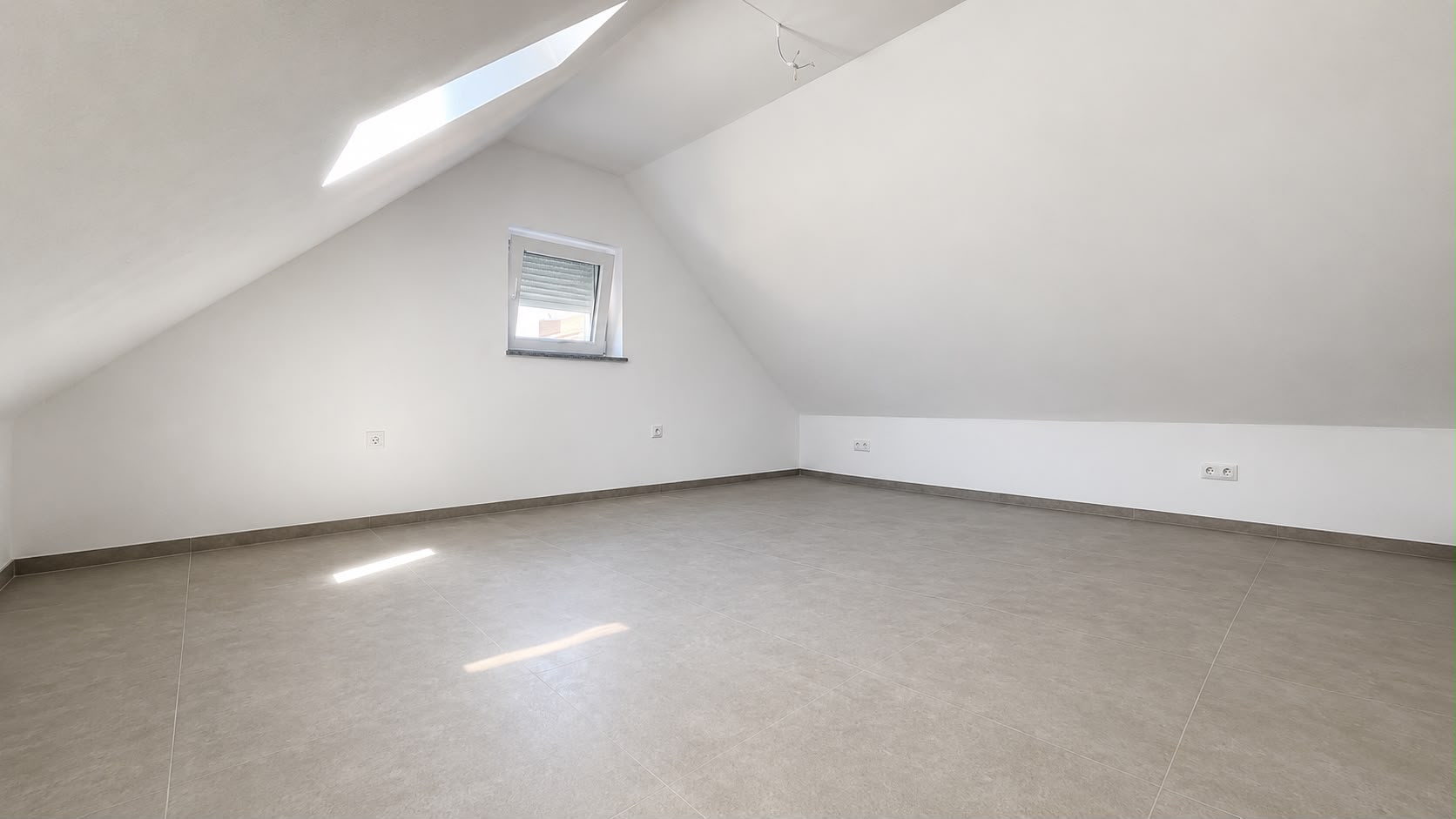 Dachgeschoss – Bodenfliesenverlegung